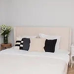 Explore The City From Its Center In A Chic Balcony Apartment